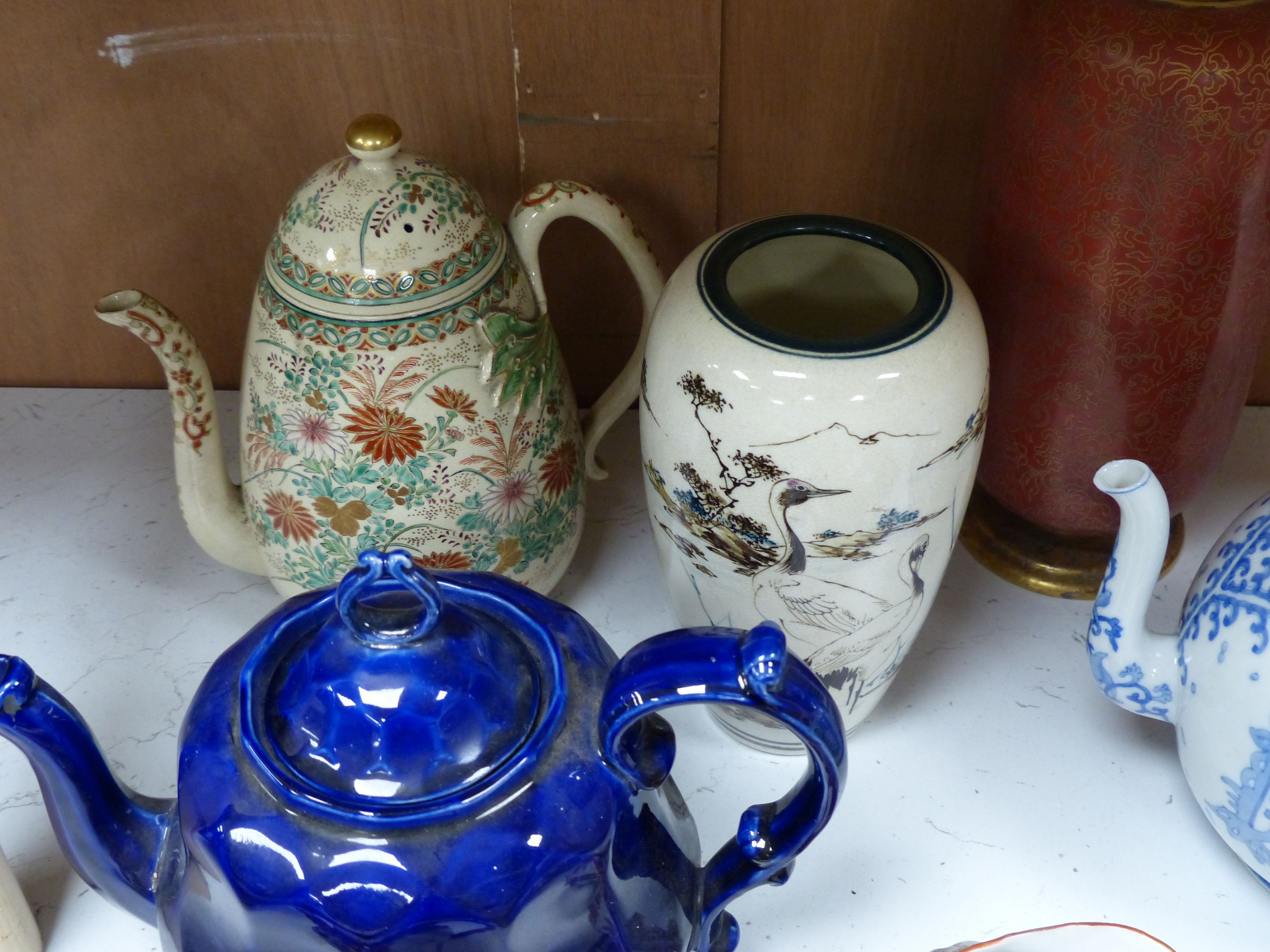 A Japanese blue and white tea kettle, Satsuma and Kutani wares etc